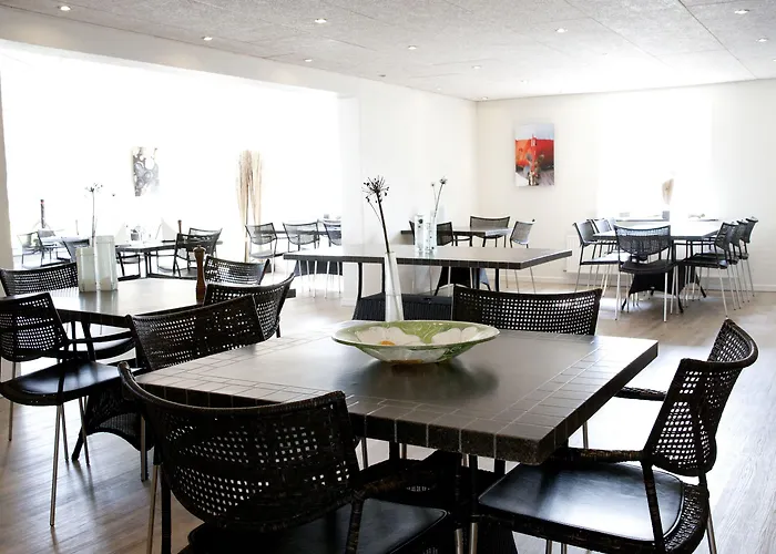 מלון Strandhotel Klitrosen 3*